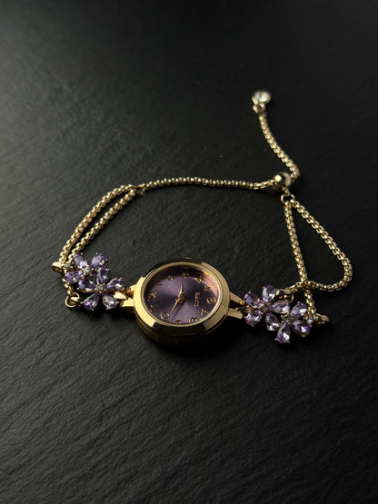 Romantic purple watch bracelet with vintage old-stock styling and floral sparkle