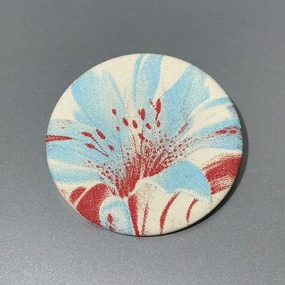Dreamcore floral compact mirror with aqua petals and rust red accents