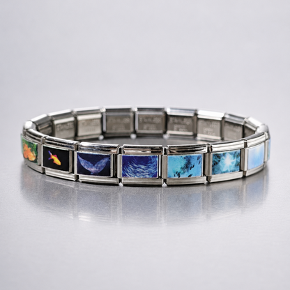 Silver-tone modular aquarium bracelet with icy blue and aqua screen-like artwork