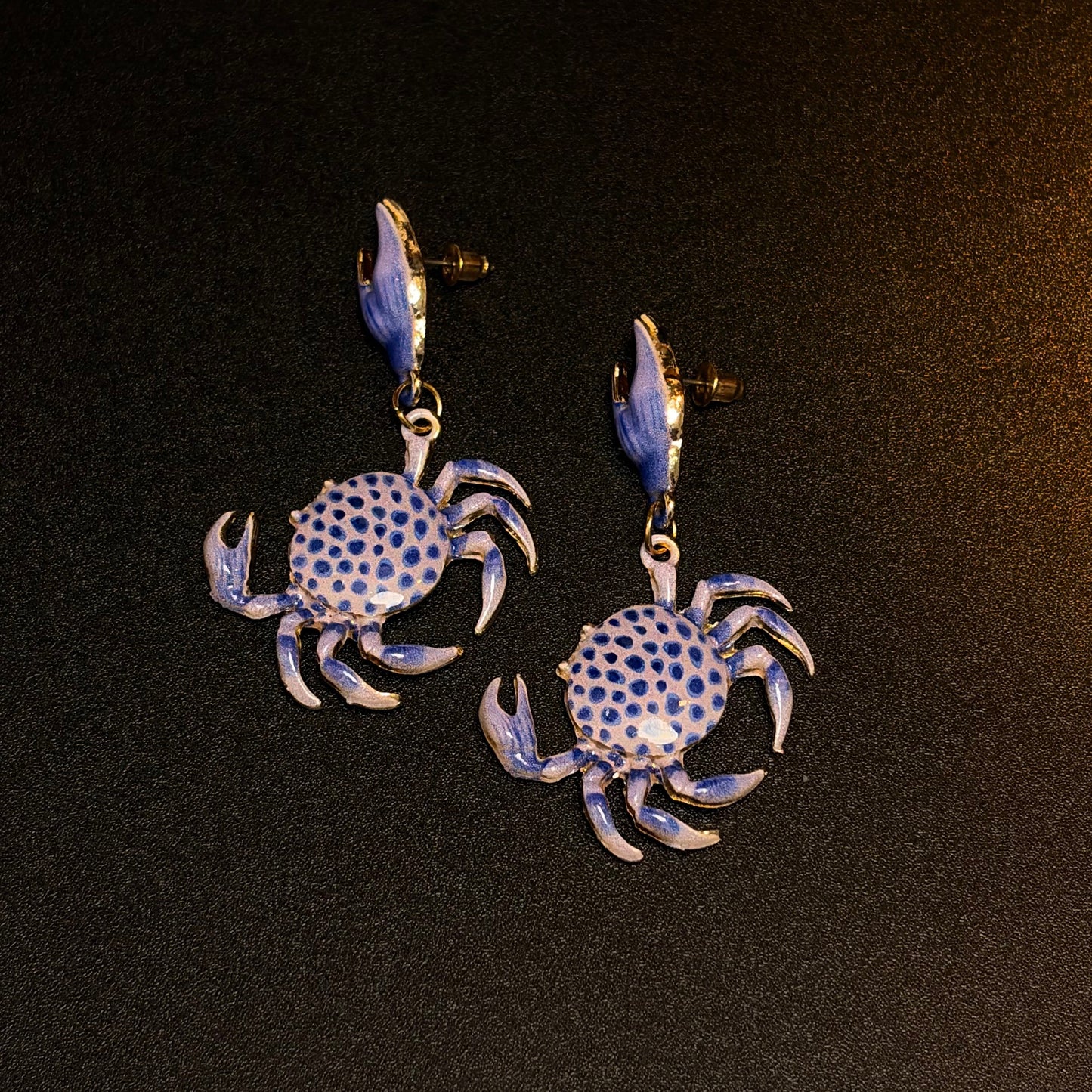 Blue crab drop earrings with raised claws and playful oceancore mood