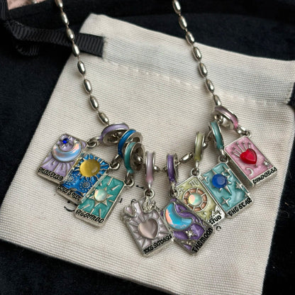 Colorful tarot card charm necklace with silver-tone chain and Y2K styling mood
