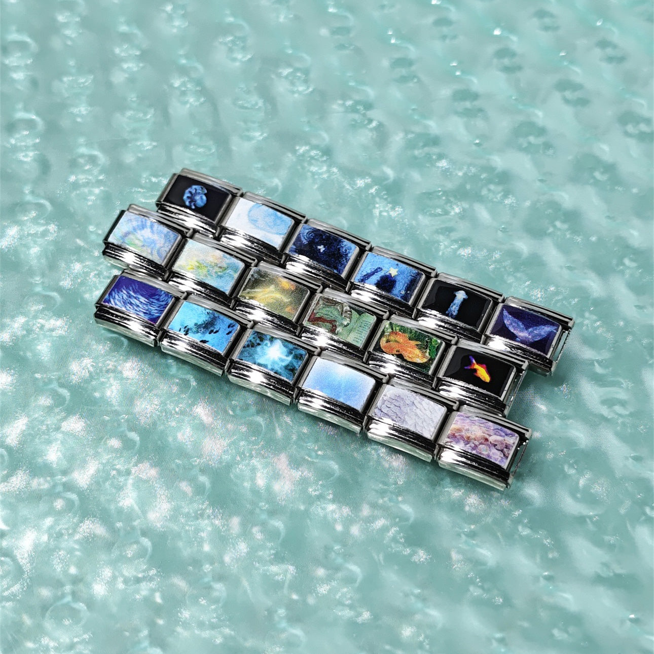 Digital dreamcore bracelet with blue water, scales, and drifting sea-life images