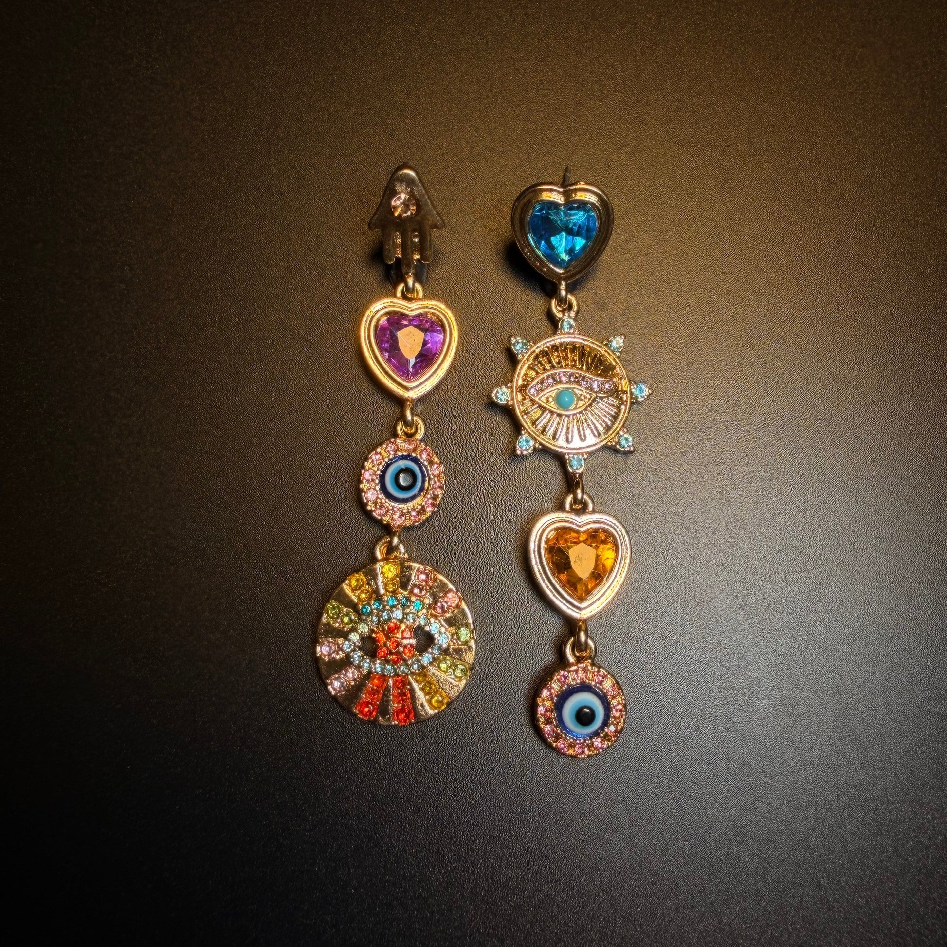 Evil eye heart charm earrings with asymmetrical vintage dangle design