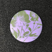 Lavender moss memory pocket mirror with purple background and green floral print