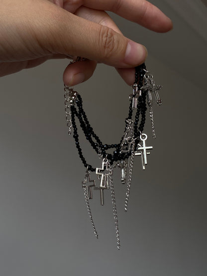 Y2K black beaded bracelet with silver-tone cross charms and layered structure