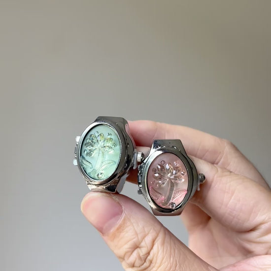 Vintage palm tree ring with decorative watch face and playful retro shape