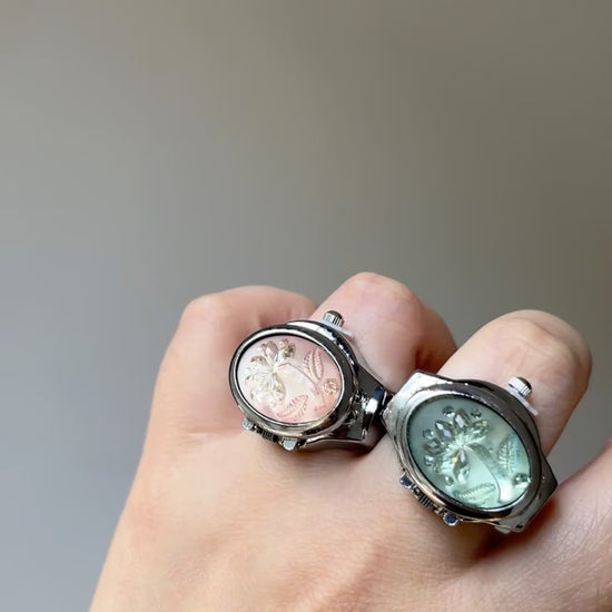 Mint and pink watch ring styles with raised palm tree accents and shiny frame