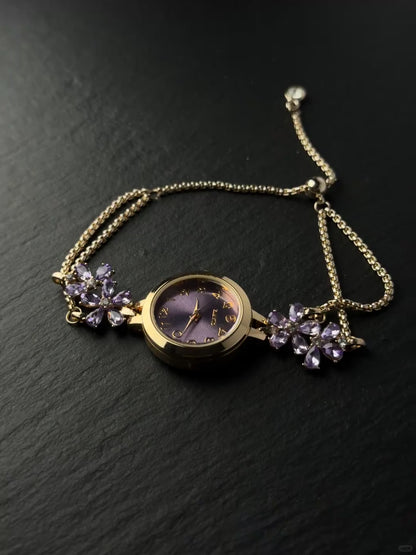 Rose gold chain watch bracelet with purple dial and soft nostalgic jewelry mood
