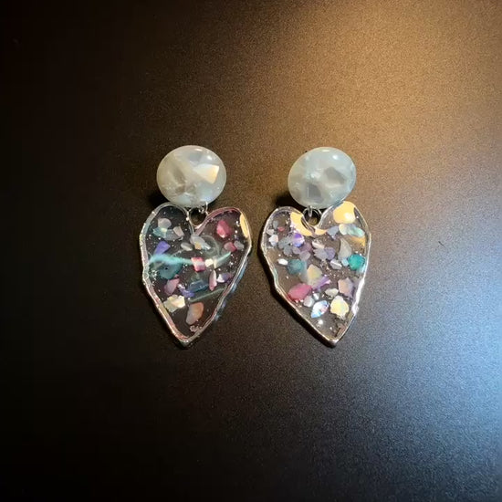 Transparent heart drop earrings with pearly studs and holographic shine