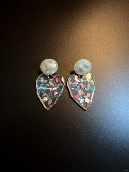 Transparent heart drop earrings with pearly studs and holographic shine