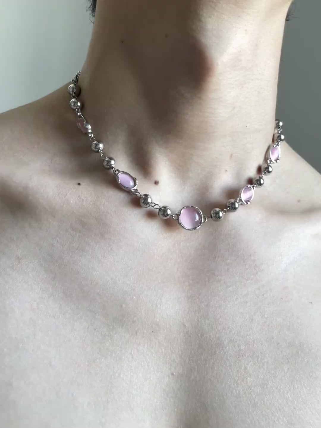 Coquette pink stone choker with titanium steel chain and rounded bead details