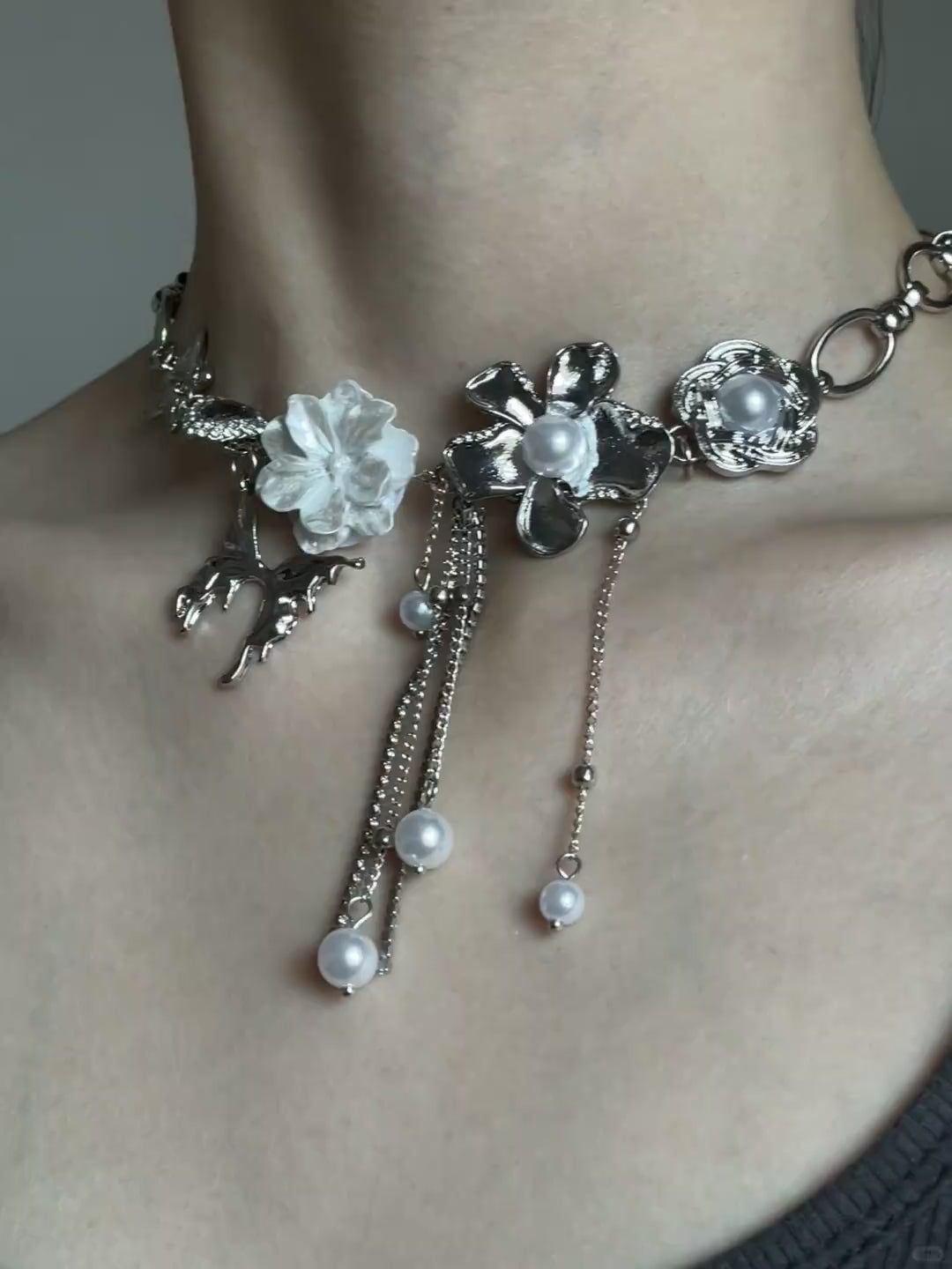 Statement flower choker with silver-tone charms and dreamy fairycore energy