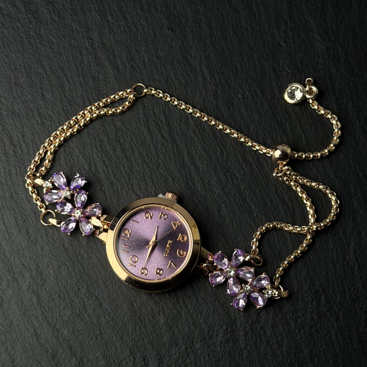 Rose gold purple flower watch bracelet with purple dial and crystal flower accents  