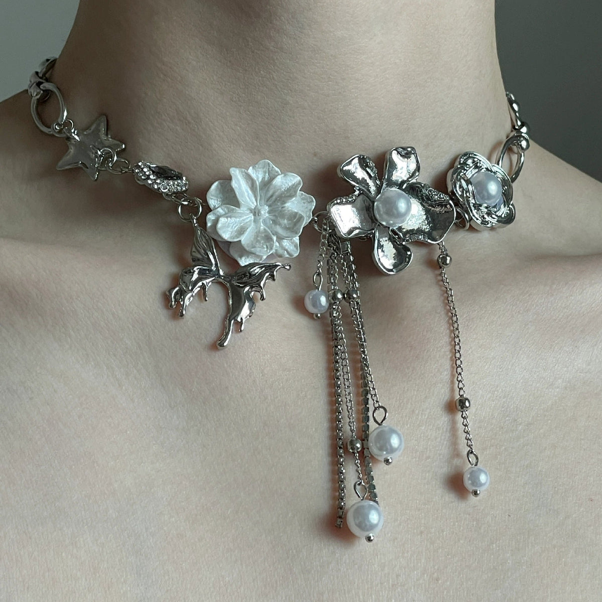 Silver floral pearl tassel choker with oversized flower charms and vintage Y2K mood