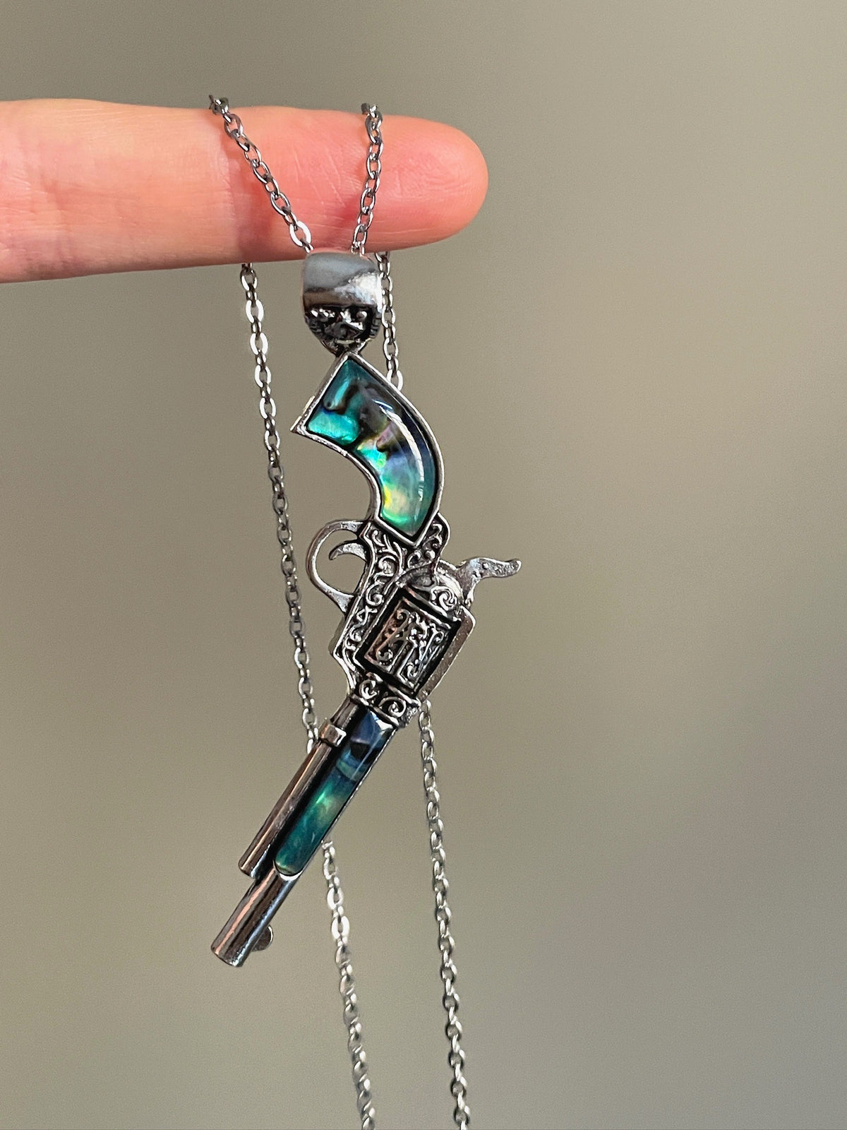 Blue shell gun pendant necklace with western relic mood and silver-tone chain
