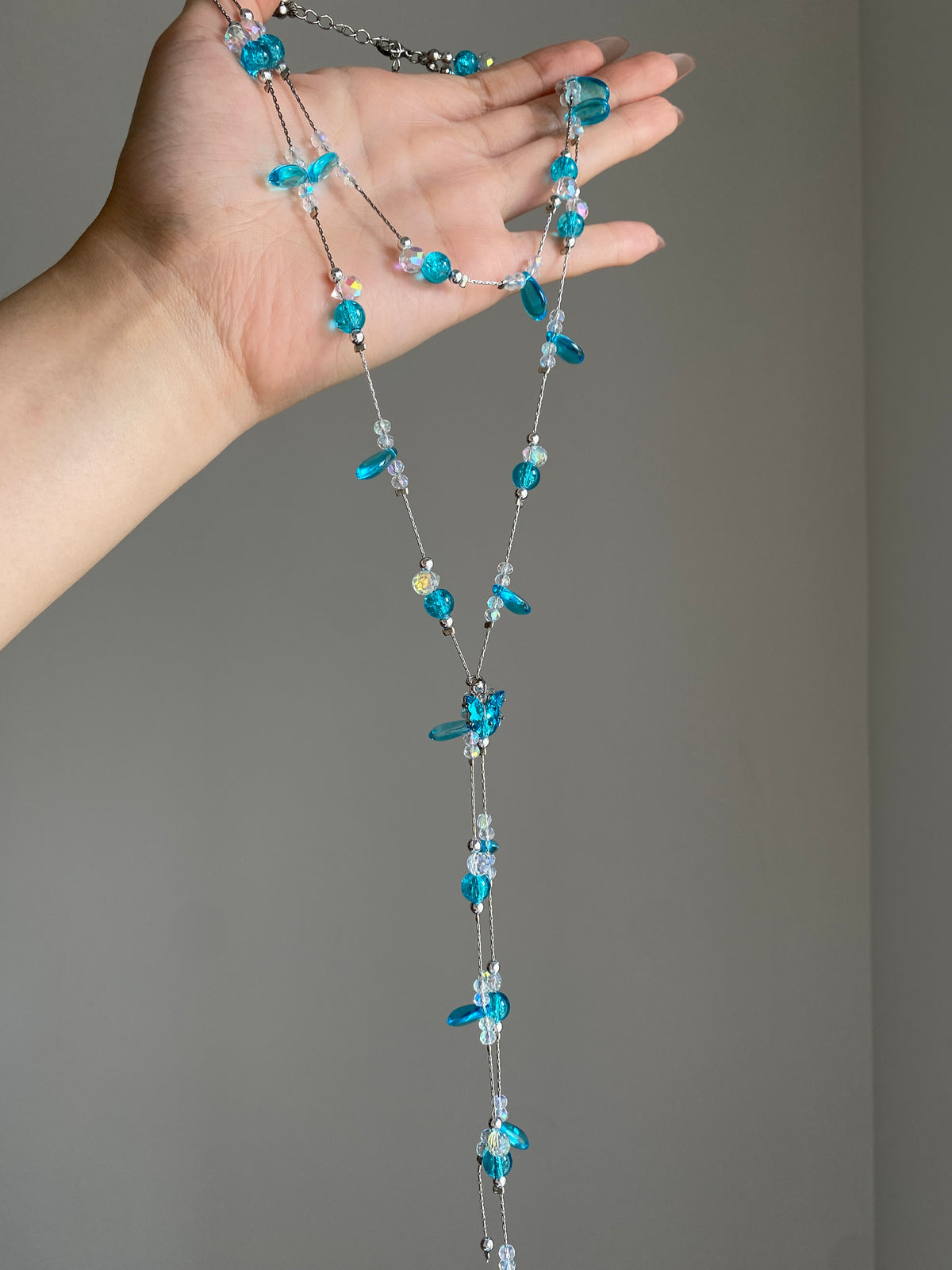 Layered aqua bead necklace with watery blue beads and clear faceted sparkle