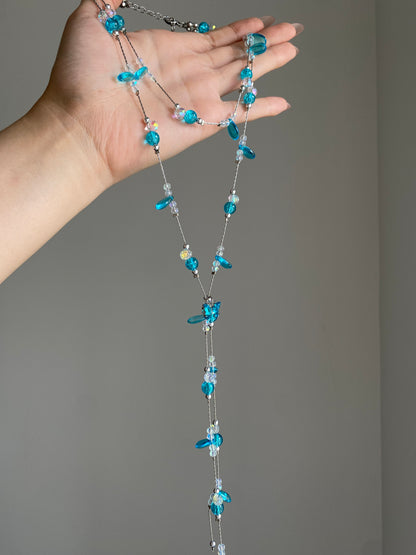 Layered aqua bead necklace with watery blue beads and clear faceted sparkle