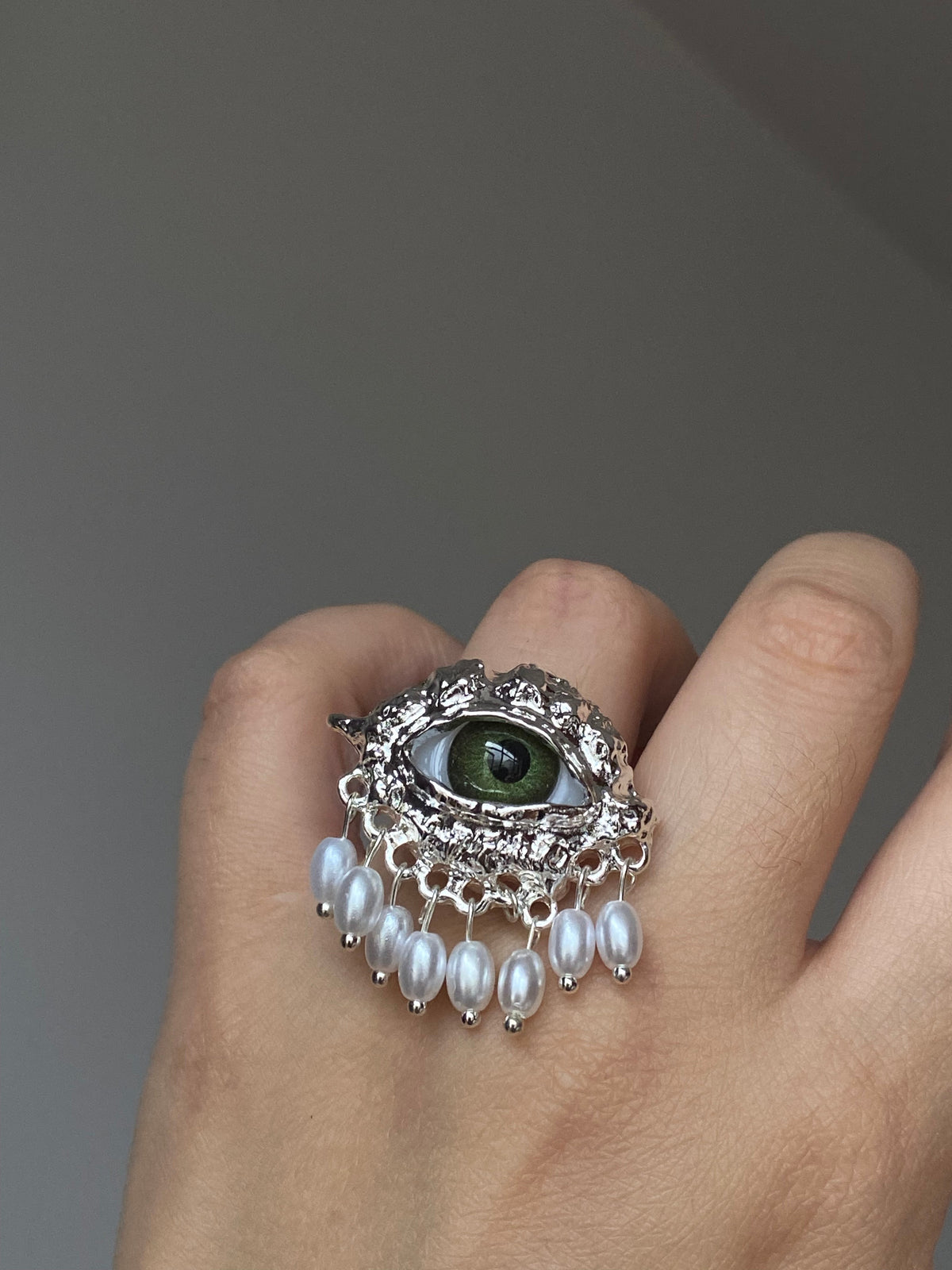 Vintage eye adjustable ring with pearl-style fringe and mystical jewelry mood