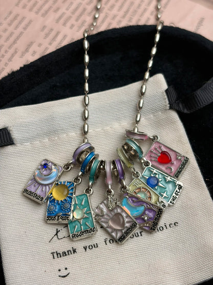 Mixable mini card pendant necklace with colorful charms and playful symbols